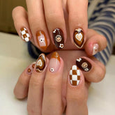 Diowino checkerboard heart coffee short nails for playful manicure