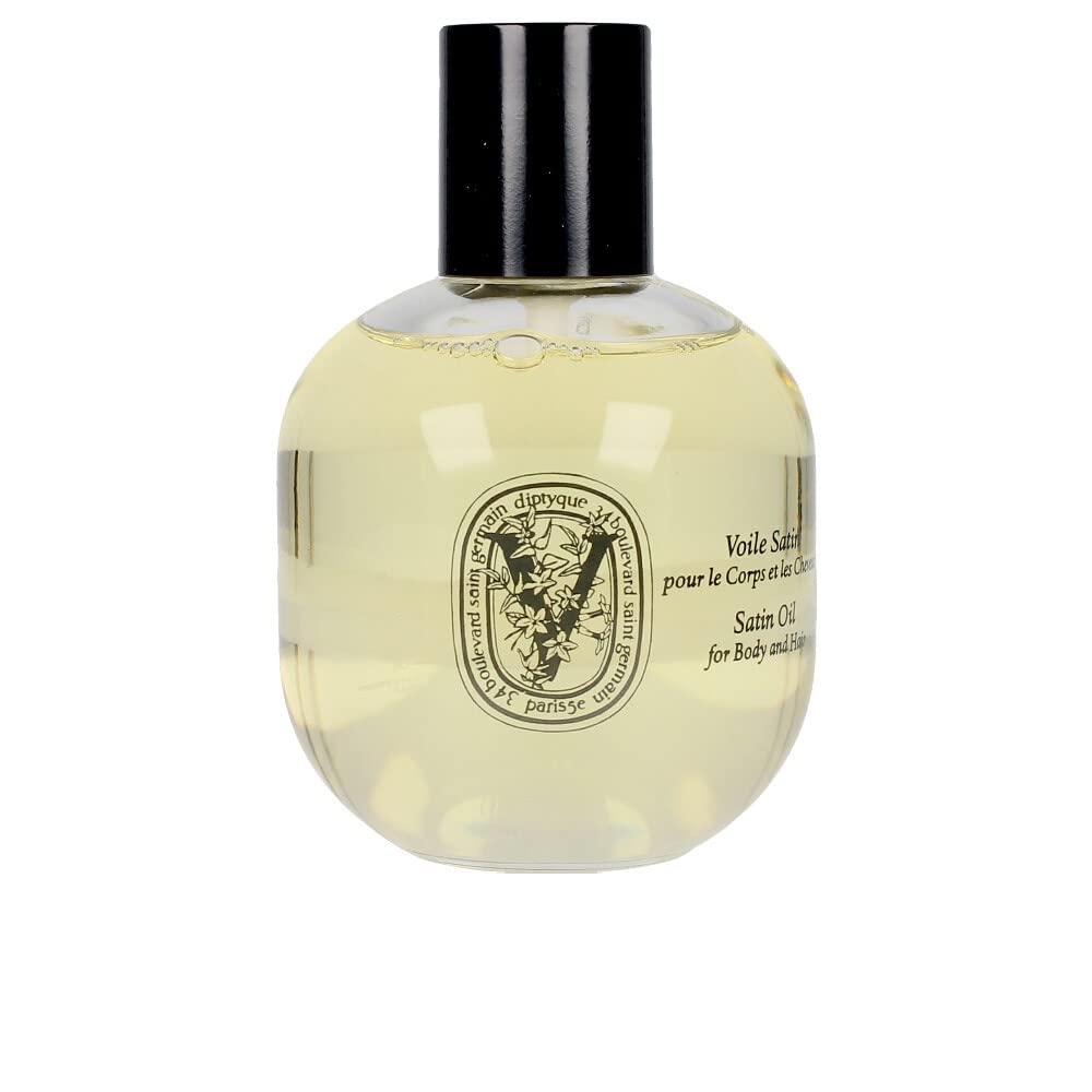 Diptyque Satin Oil for Body and Hair nourishes skin and hair with delicate fragrance.