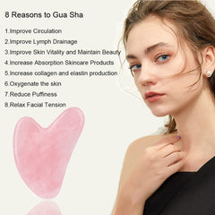 Ditind Rose Quartz Gua Sha close-up view highlighting the smooth edge for gentle scraping.