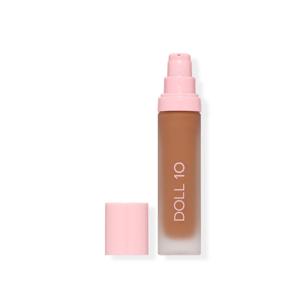 DOLL 10 NO T.C.E bottle with pump for easy, hydrating full-coverage application.