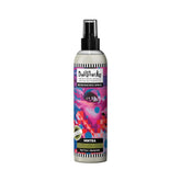 Dollylocks Refreshening Spray bottle close-up showing tea tree spearmint aroma