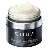 DOMINAS Dark Spot Corrector Cream bottle front showing brightening formula for even skin tone.