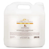 Dominican Magic Detangler Coconut Infused bottle for easy detangling and smooth glide.