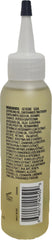 Doo Gro Mega Long Oil in use on hair for detangling and smoothing.