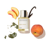 Dossier Ambery Peach bottle front view with minimalist design and lasting impression.