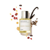 Dossier Powdery Tobacco bottle pour, a refined unisex fragrance for everyday elegance.