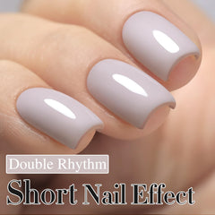 Double Rhythm gel polish brush applying sheer color for a DIY manicure.