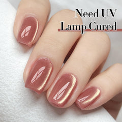 Double Rhythm magnetic glitter forming cat-eye pattern on nails