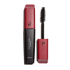 Doucce Punk Volumizer Mascara closeup of the XXL wand lifting and separating lashes.