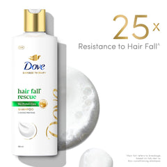 Dove Hair Fall Rescue Shampoo pump being pressed.