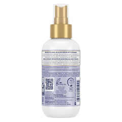 Dove Hair Therapy serum applied to ends for smoother, healthier-looking hair