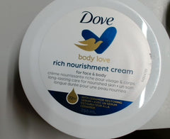 Dove Nourishing Body Care bottle shows rich moisturization in a portable package.