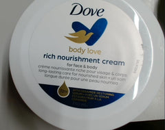 Hands applying Dove Nourishing Body Care illustrate quick, on-the-go moisturization.