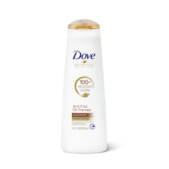 Dove Nutritive Solutions Oil Therapy Shampoo bottle pouring for frizz control