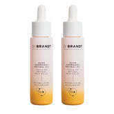 Dr. Brandt Bright This Way Glow Overnight Oil bottle on vanity suggesting nighttime radiance.
