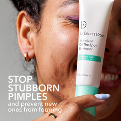 Close-up of Alpha Beta Spot Eliminator being applied to skin for spot treatment.