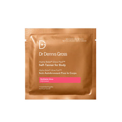 Dr Dennis Gross Glow Pad Body towelette close-up texture reveals exfoliating micro-particles.