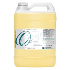 Dr Joe Lab Camellia Seed Oil bottle pour shows pure moisturizing potential for skin and hair.