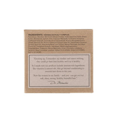 Dr. Miracle's Gro Oil amber bottle close-up, packaging for hair and scalp nourishment