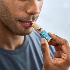 Dr. Squatch Wild Watermelon lip balm stick offers fruity hydration.