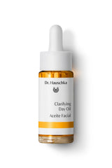 Dr. Hauschka Clarifying Day Oil bottle promoting balanced skin on a clean surface.