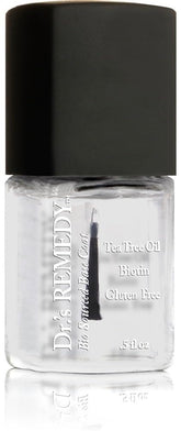 Dr. Remedy Clear Base Coat bottle protecting nails and creating a smooth base.