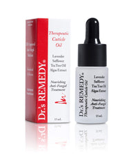 Dropper applying Caress Cuticle Oil to nails for rejuvenation
