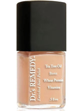Dr. Remedy Purity Peach bottle closeup showing non-toxic, plant-based formula for healthy nails.
