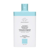 Drunk Elephant Cocomino Marula Cream Conditioner bottle shows color-safe moisturizing benefits.