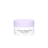 Drunk Elephant Lala Retro whipped cream jar close-up shows hydration-ready texture.