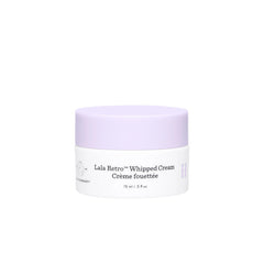 Drunk Elephant Lala Retro whipped cream jar close-up shows hydration-ready texture.