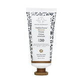 Drunk Elephant Umbra Cocoa Mineral Cream bottle close-up showing mineral SPF protection for daily use.