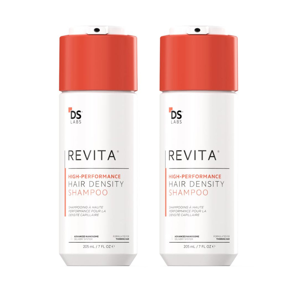 DS Laboratories Revita Shampoo bottle pouring for a clean scalp cleanse.