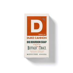 Duke Cannon Bourbon soap bar close-up emphasizing warm, earthy fragrance and smooth skin care