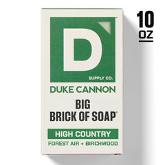 Duke Cannon High Country triple-milled soap close-up showing dense, luxurious lather.