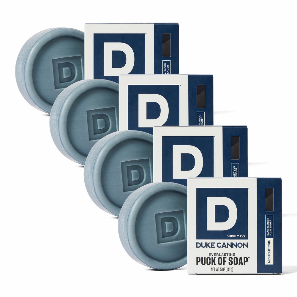 Duke Cannon Midnight Swim four-pack bar soap puck front view, rugged cleansing for daily use.