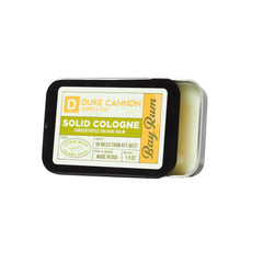 Duke Cannon solid cologne Bay Rum bottle pour for quick, on-the-go scent.