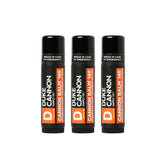 Duke Cannon Tactical Lip Protectant Balm in an open jar for quick lip hydration.