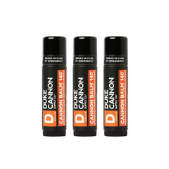 Duke Cannon Tactical Lip Protectant Balm in an open jar for quick lip hydration.