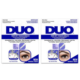 DUO Quick-Set lash glue bottle closeup shows fast-drying, latex-free formula.
