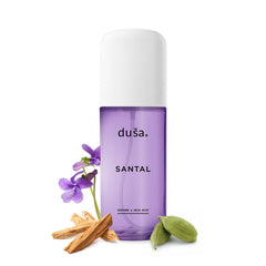 DUSA Santal hair perfume bottle close-up highlighting creamy, woody notes for daily wear.