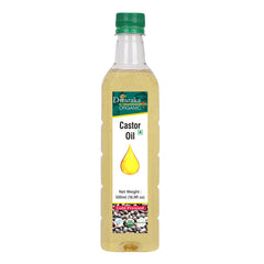 Dwaraka Castor Oil bottle pour for easy application on hair and skin.