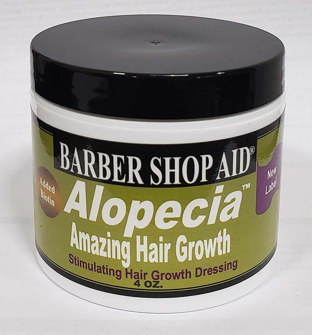 D WRIGHT ALOPECIA biotin bottle closeup showing a nourishing scalp care formula.