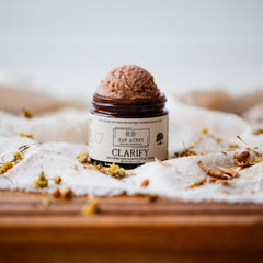 Jar closeup of EAP Acres Clarify with natural ingredient label.