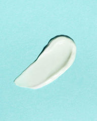 Spoon dispense of Mermaid Milk demonstrates easy, mess-free application