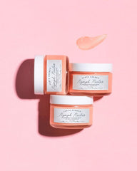 Hands applying NYMPH NECTAR balm at night for moisturized skin