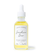 Earth Harbor Sunshine Dew bottle close-up for makeup removal and gentle cleansing