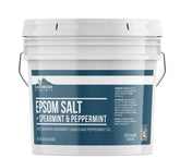 Earthborn Elements foot soak bucket with spearmint leaves for a minty refresh.
