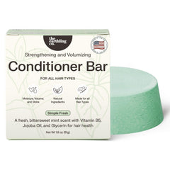 The Earthling Co. conditioner bar packaging closeup, eco-friendly design ideal for travel.