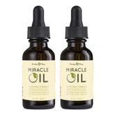 Earthly Body Miracle Oil bottle label highlights natural ingredients and vegan formula.